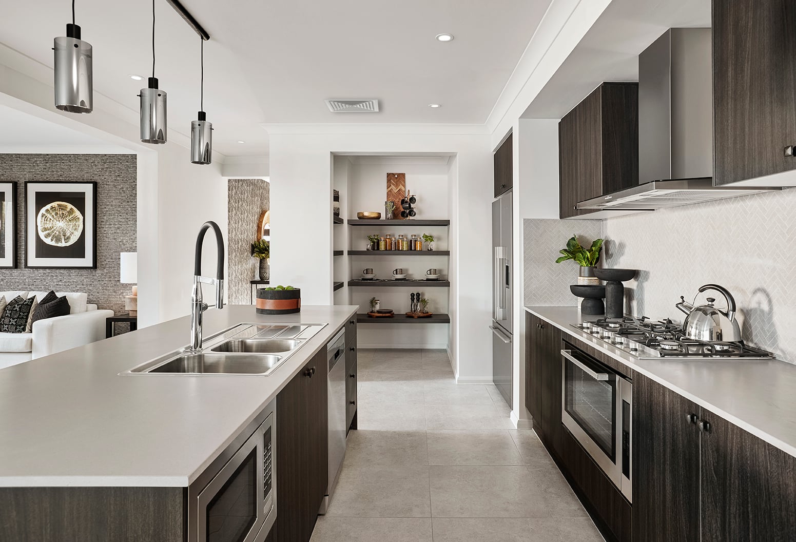 A modern Adelaide kitchen with a ducted ceiling vent quietly conditioning the open-plan space.
